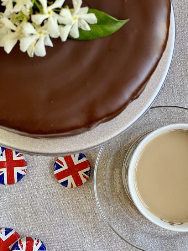 overhead chocolate biscuit cake and cup of tea