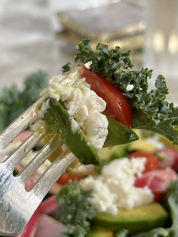 fork full of kale salad