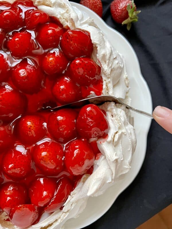 cutting strawberry dessert