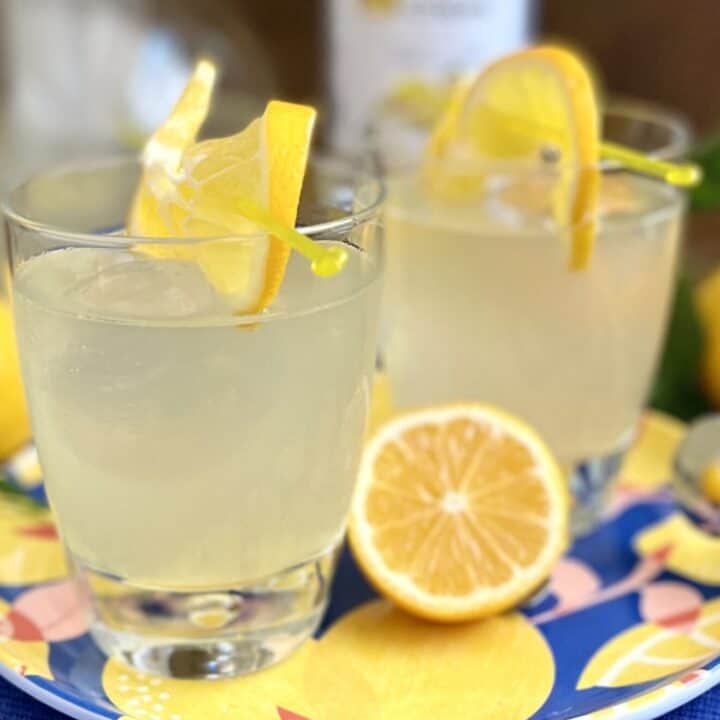 glasses of hard lemonade with lemon horizontal