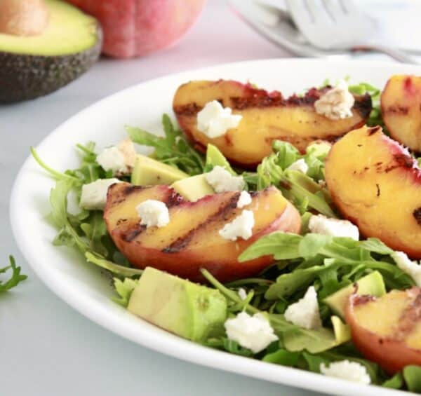 grilled peach, avocado, goat cheese and arugula salad
