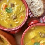 soup joumou in red bowls overhead