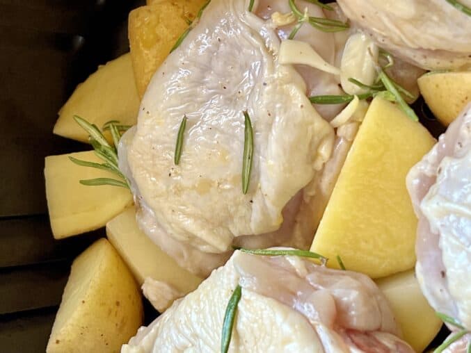 raw chicken and potatoes