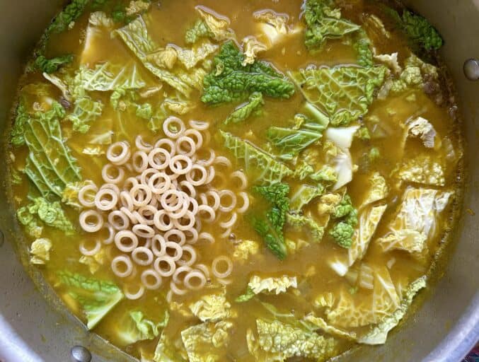 adding pasta to soup joumou