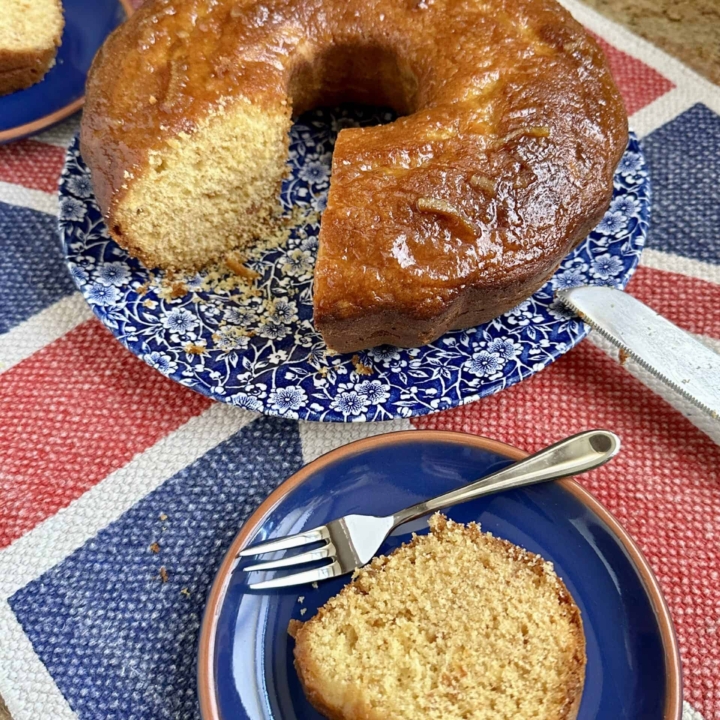 slice of orange marmalade cake with cake on plate