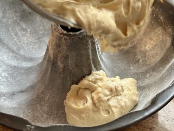 batter going into bundt pan