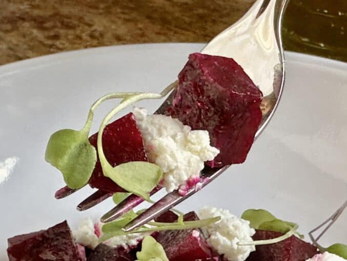 forkful of beetroot and goat cheese 