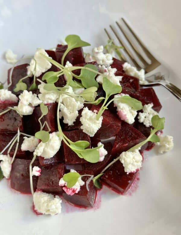 Beet and goat cheese salad with fork