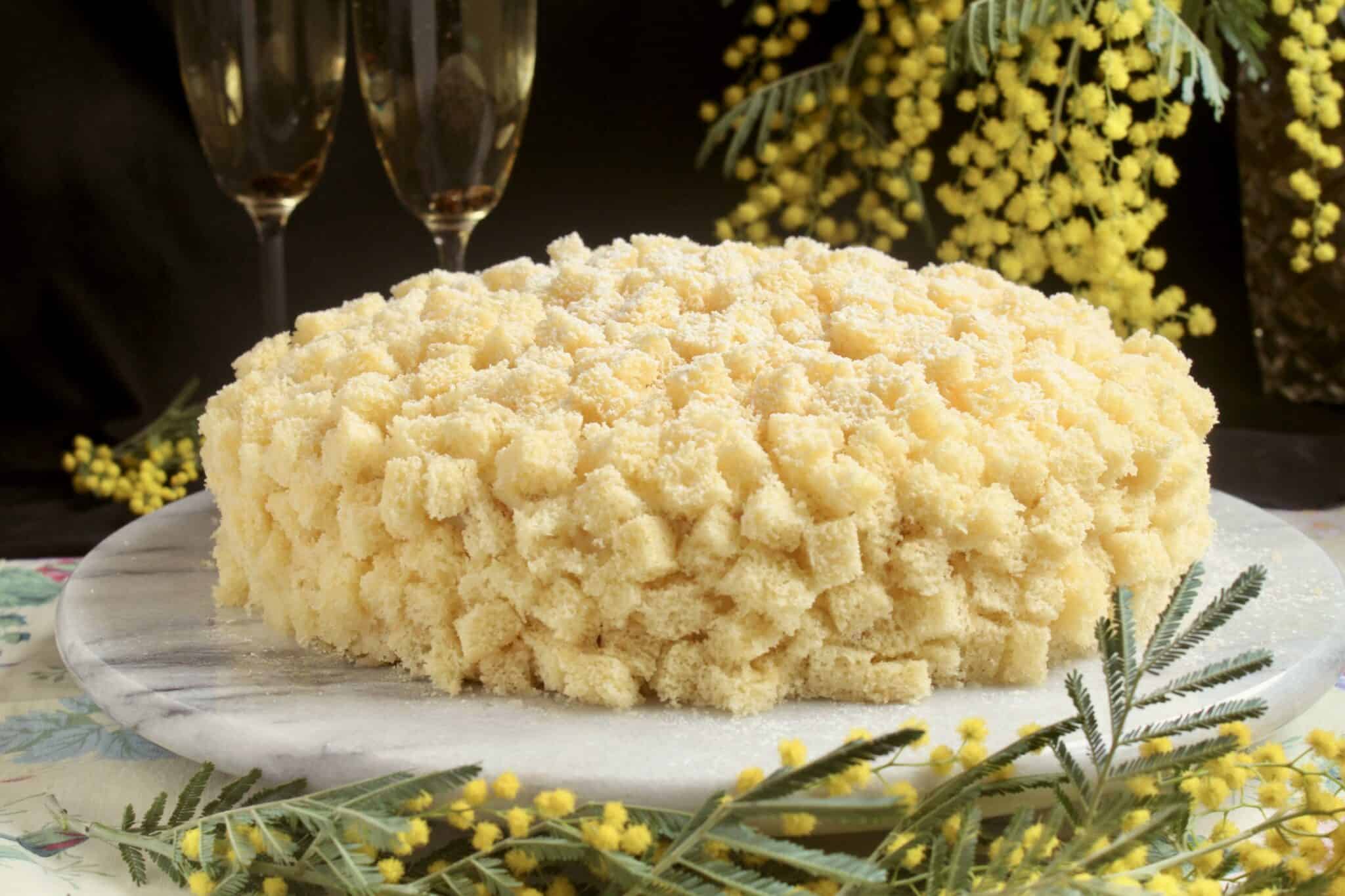 international Women's Day cake with mimosa and glasses