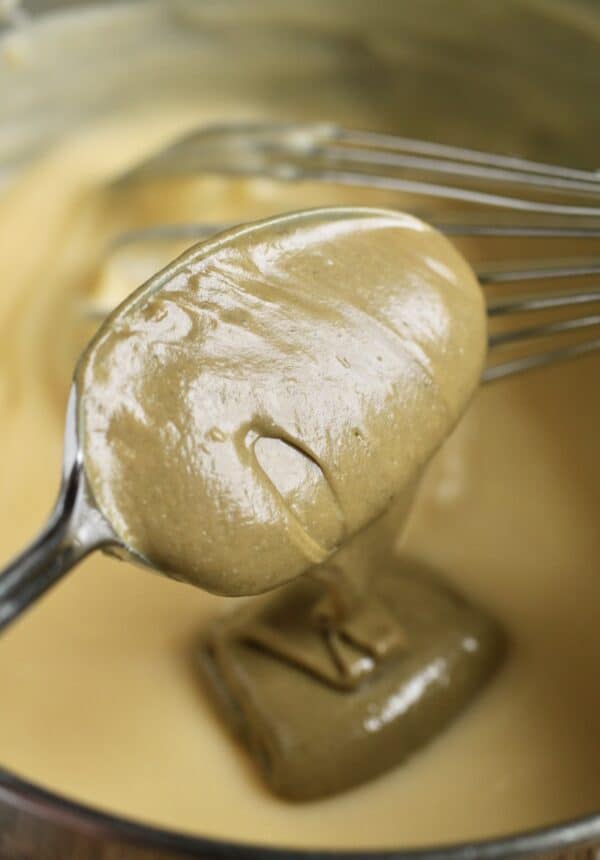 cream of pistachio spooning into crema