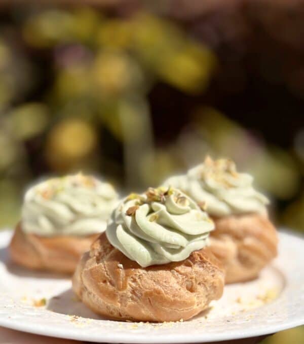 pistachio cream zeppole di san giuseppe on a plate