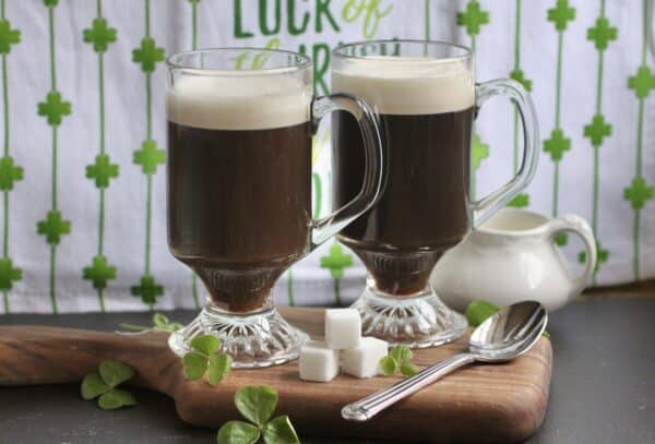 Irish whiskeys with sugar cubes on a board