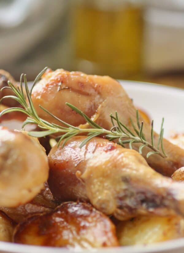 close up of drumsticks and rosemary