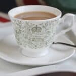 cup of loose leaf tea in a Coronation cup and saucer (social)