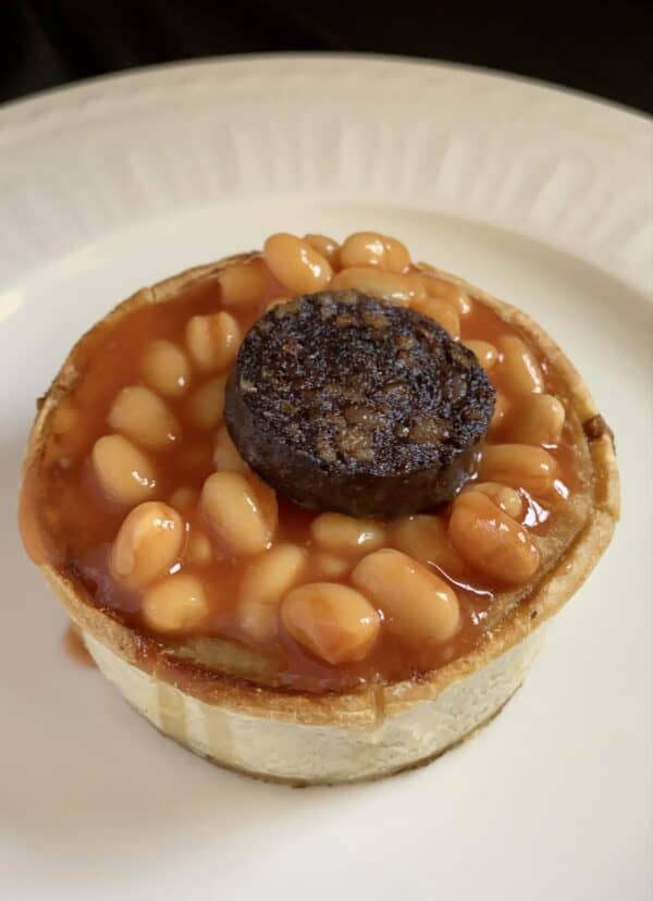 Scotch pie and beans with black pudding
