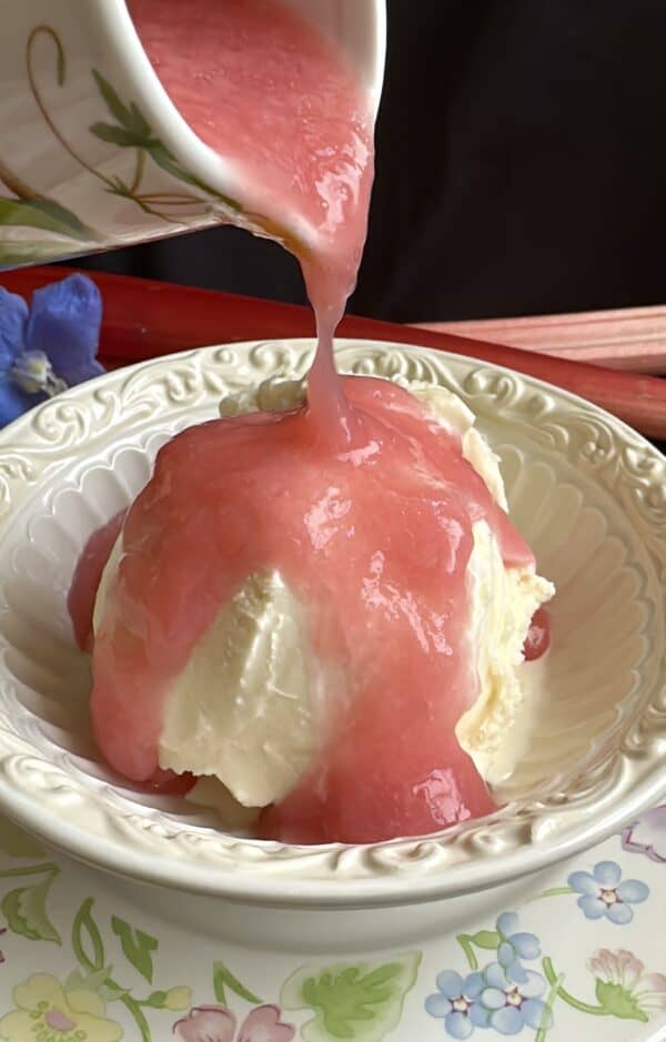 pouring sauce over ice cream