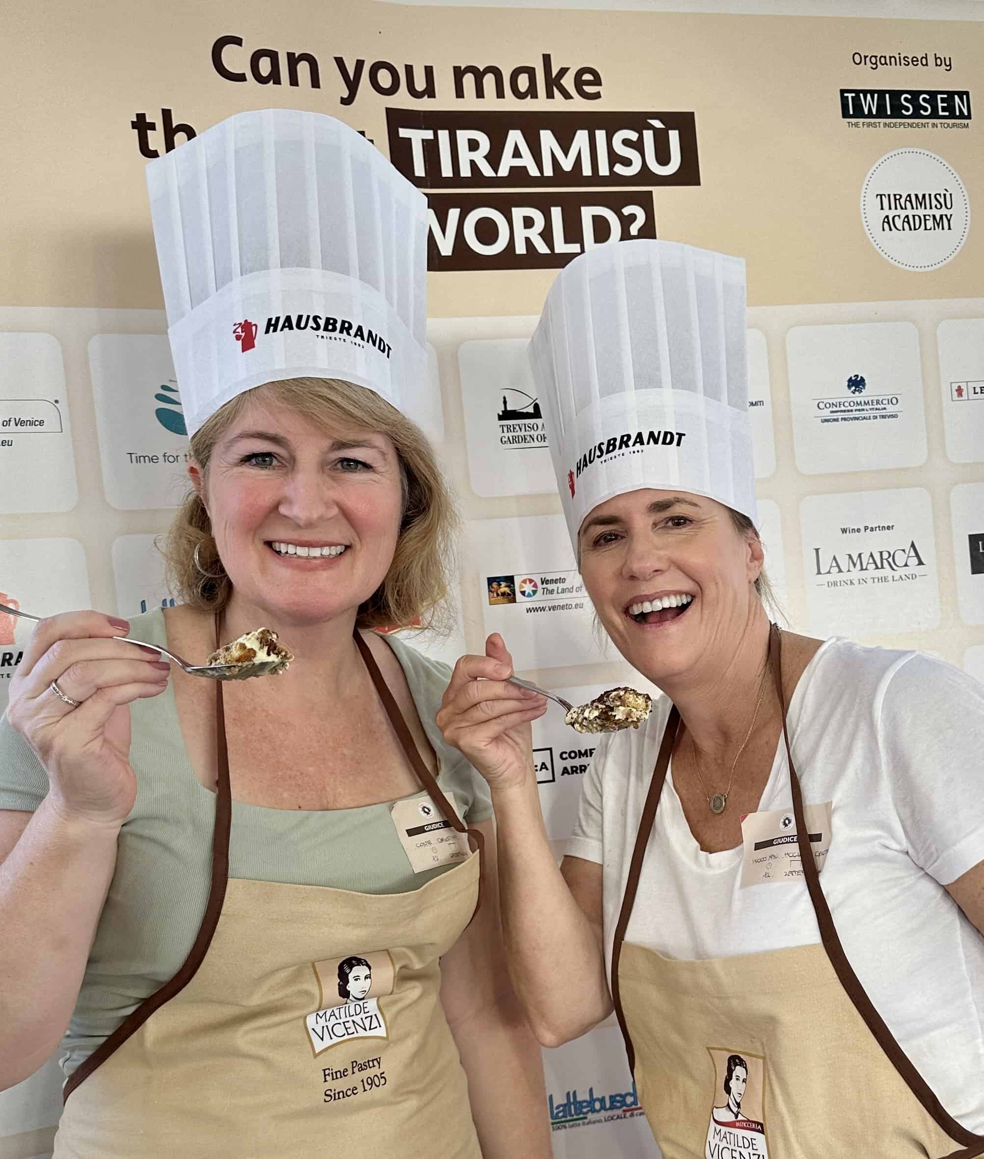 Christina Conte and Cynthia Woodman in Treviso, Italy holding samples on spoons