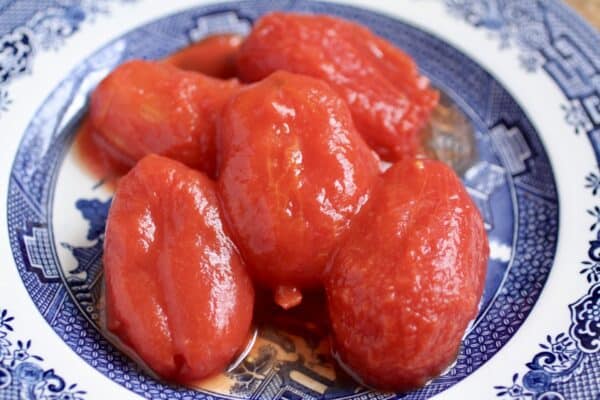 whole peeled roma tomatoes in a bowl