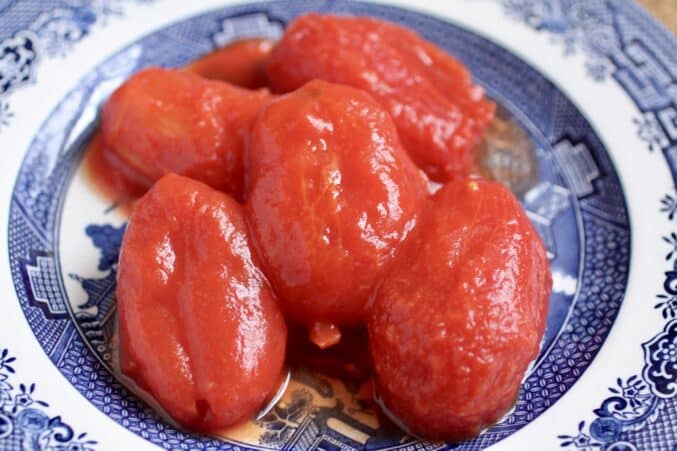 whole peeled roma tomatoes in a bowl