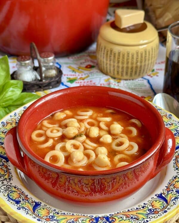 pasta e ceci in a red bowl