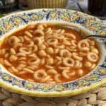 pasta e ceci in a red bowl