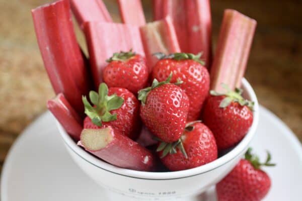 strawberries and rhubarb in a bowl