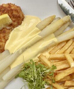 German food: schnitzel, asparagus and fries