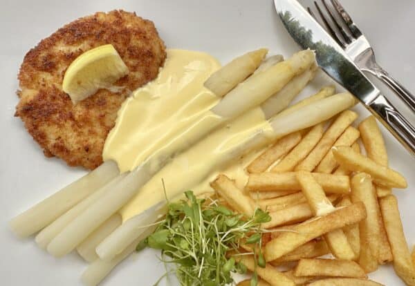 German food: schnitzel, asparagus and fries