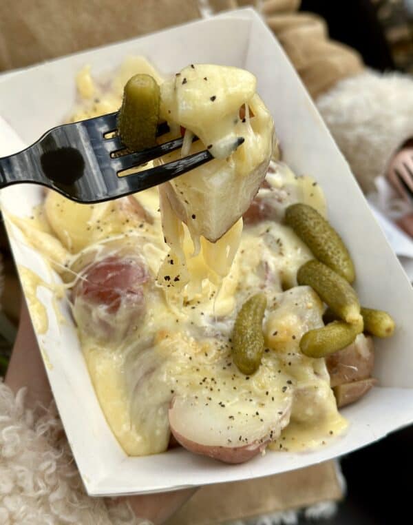 raclette with potatoes and cornichons in NYC