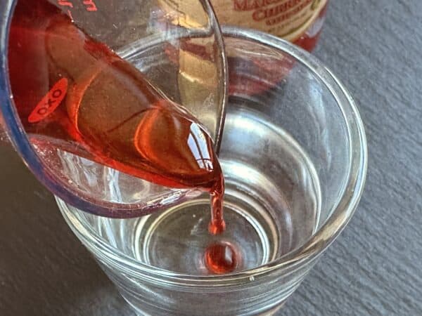 pouring in maraschino liquid