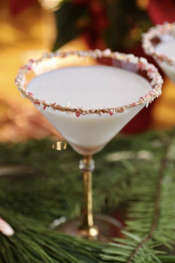 peppermint martini with crushed candy on the rim
