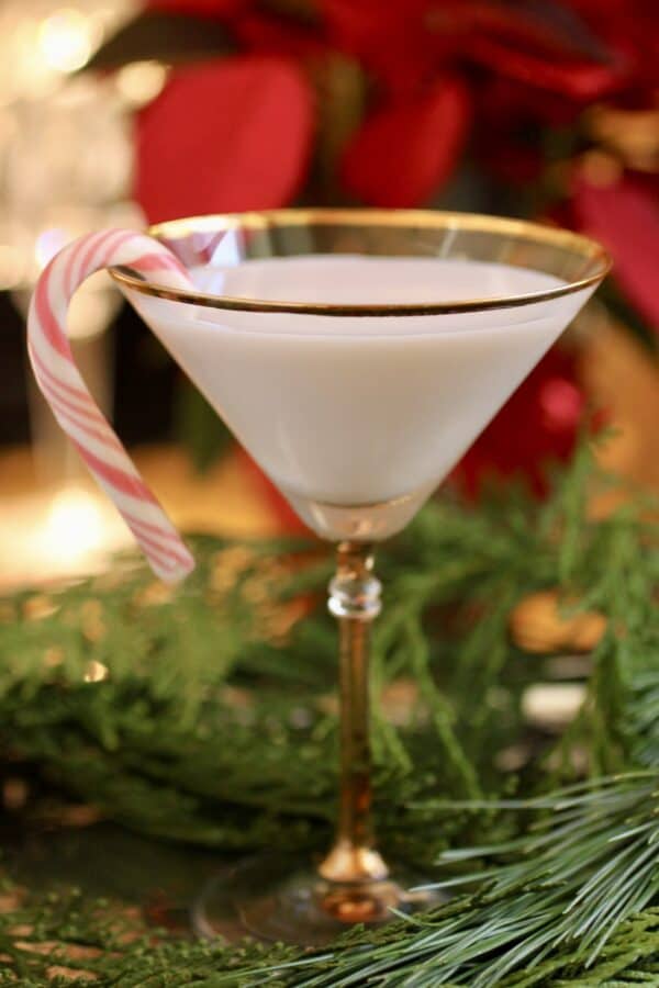 peppermint martini with wee candy cane on rim