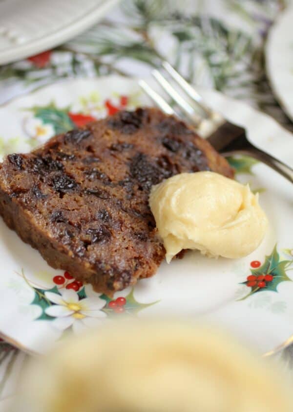 slice of Christmas pudding and brandy sauce