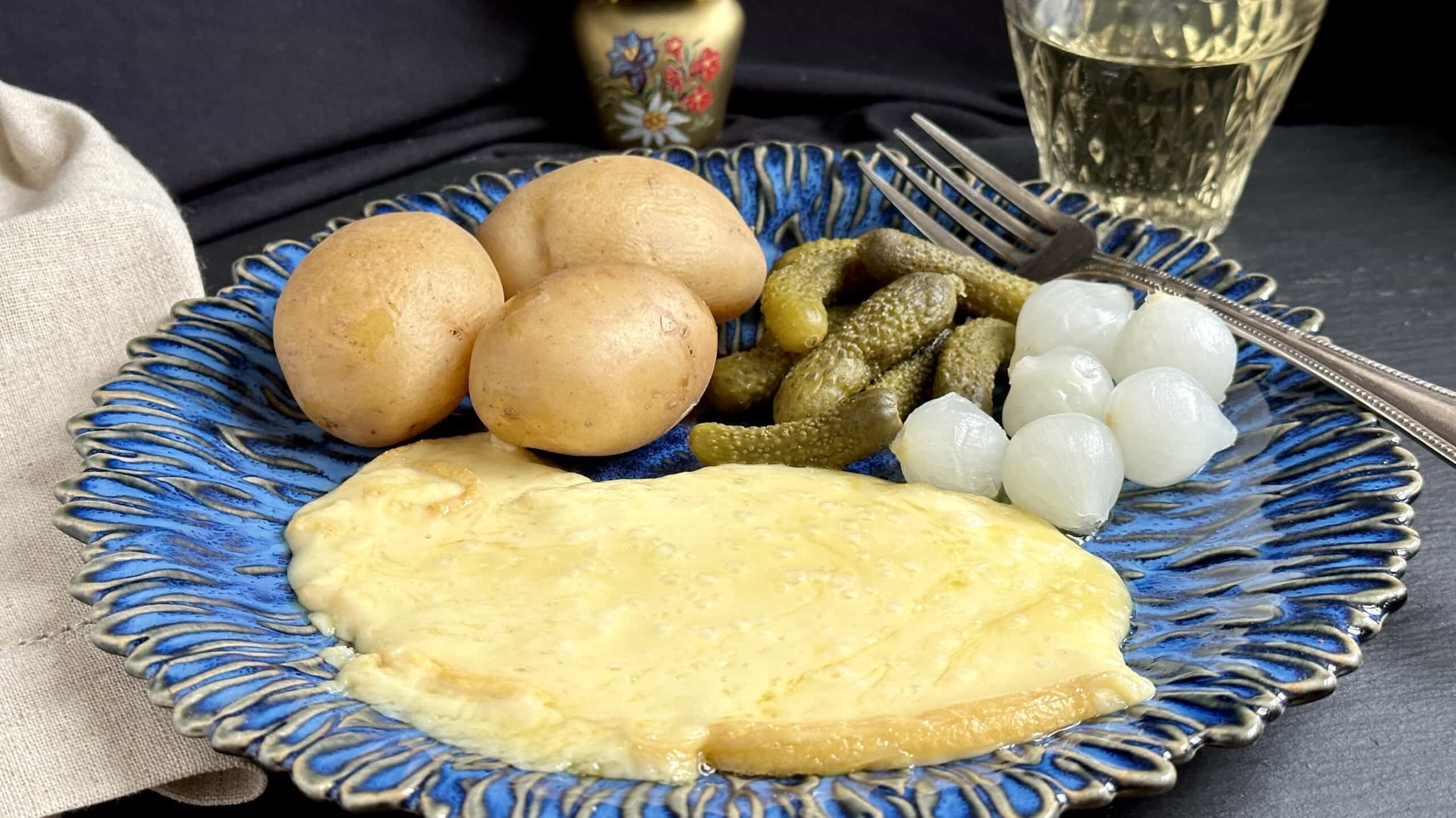 raclette with potatoes and pickles