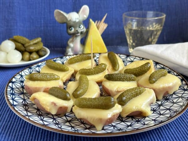 raclette potatoes on a blue plate raclette potatoes on a blue plate