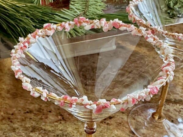 rimmed martini glass with peppermint