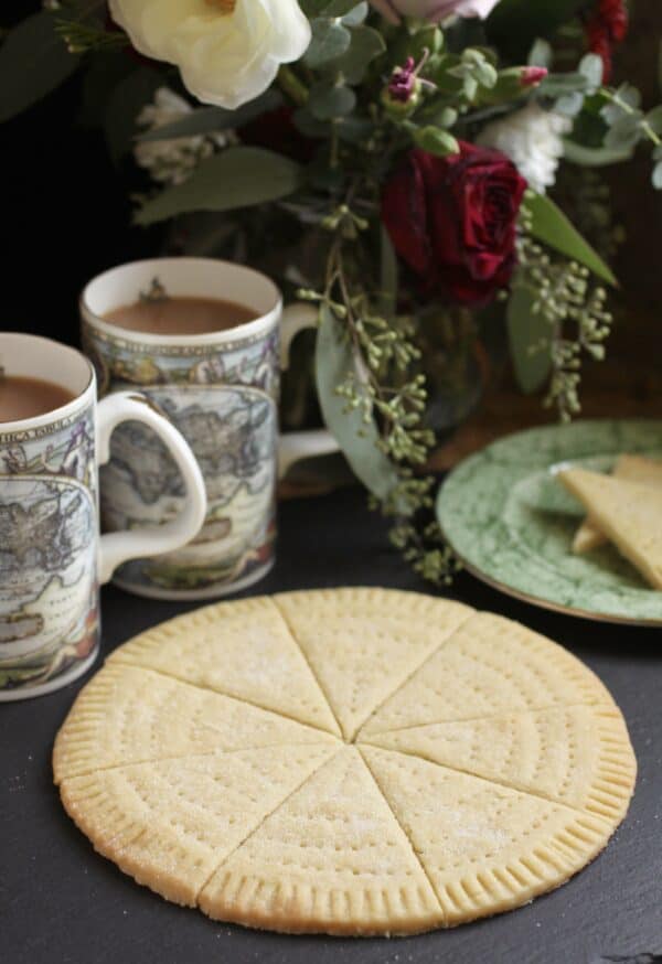 petticoat tails shortbread with 2 cups of tea and flowers