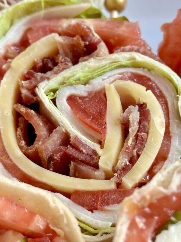 Heart in the center of a club sandwich pinwheel