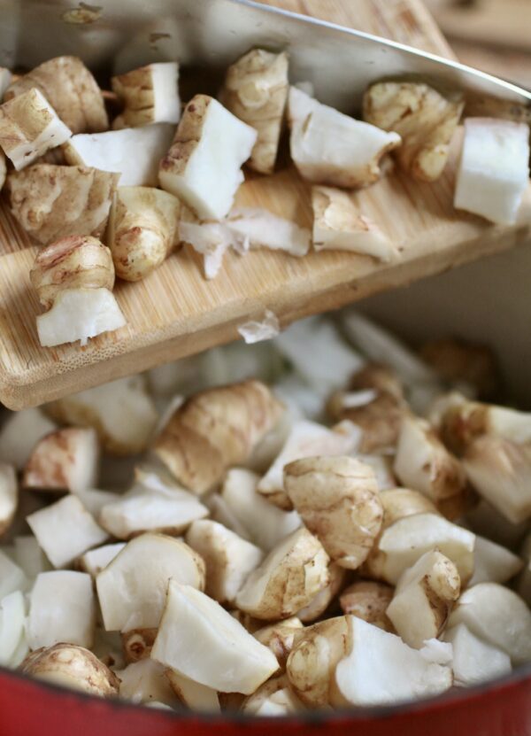 adding sunchokes to pot