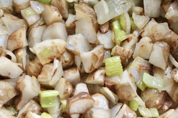 sunchokes cooking with celery and onion