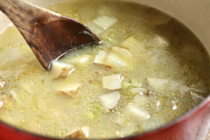 stirring the sunchoke soup