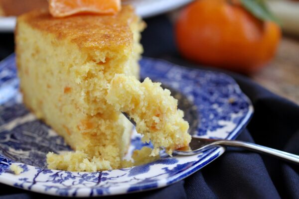 piece of mandarin orange cake on a fork