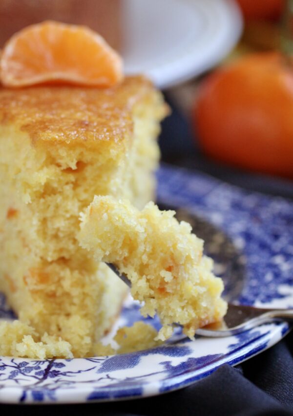 piece of mandarin orange cake on a fork