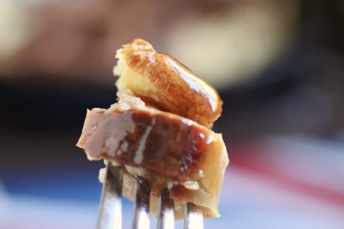 bite of toad in the hole on a fork