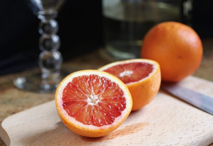 cut halves of a blood orange