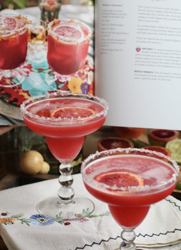 glasses in front of a cookbook for the same recipe