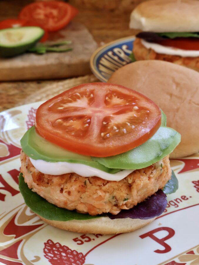 assembling salmon patty sandwich