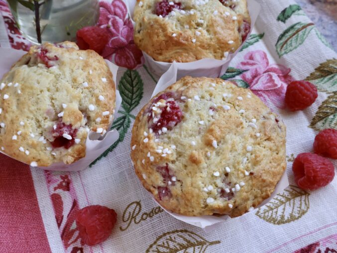 raspberry muffins on tea cloth