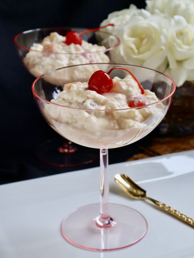 glorified rice in pink glasses with cherries on top