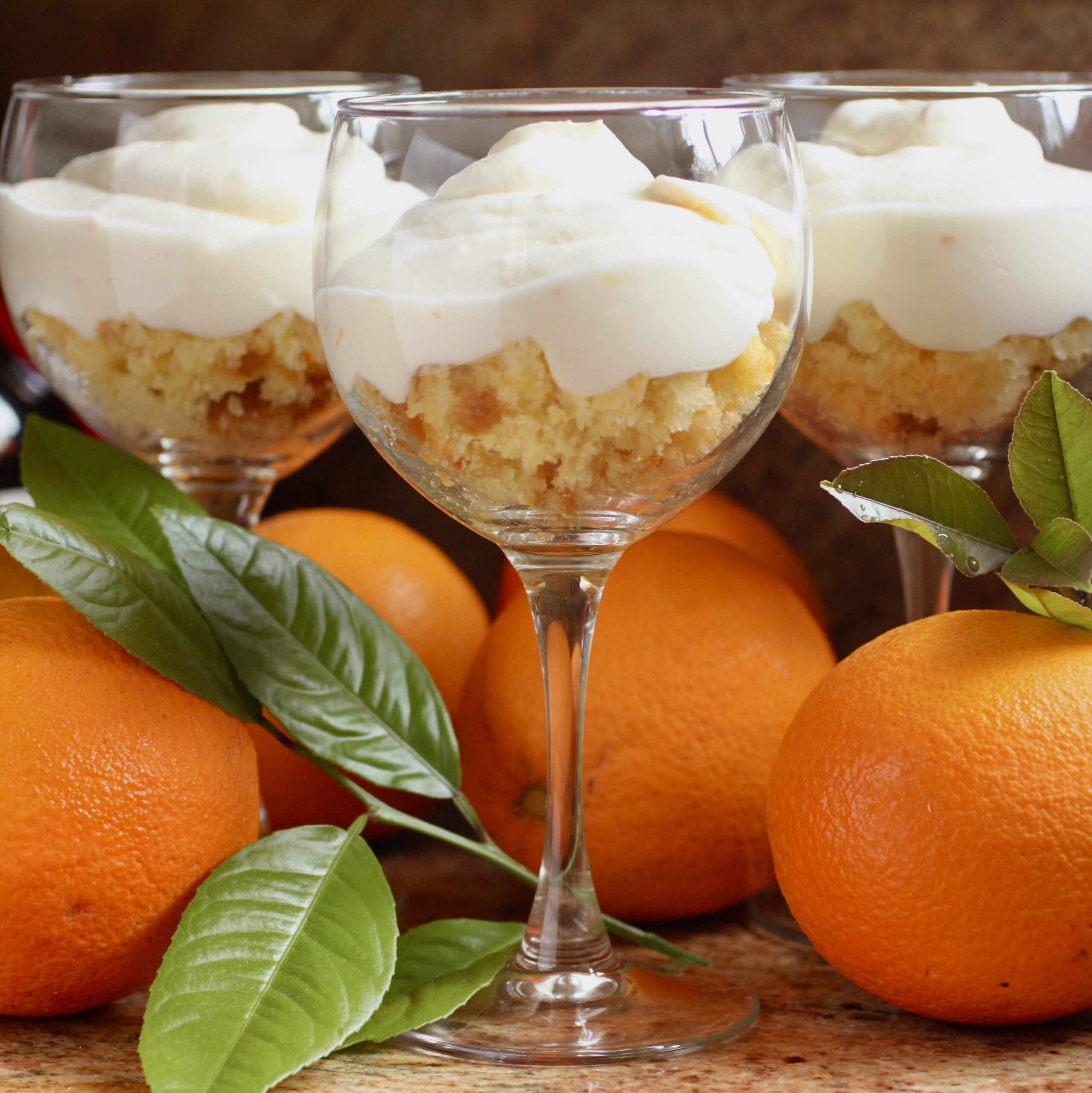 Boodles Orange Fools in stemmed glasses with oranges